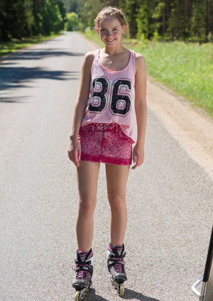 1 dark haired female tortures another during lezdom play in concrete cellar